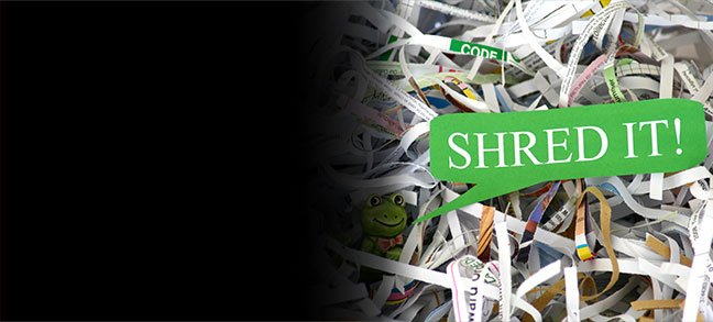 A bin of shredded paper with a frog in it encouraging you to join us for shred day.