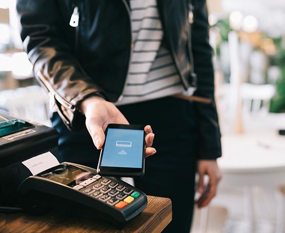 Person using phone to make digital payment